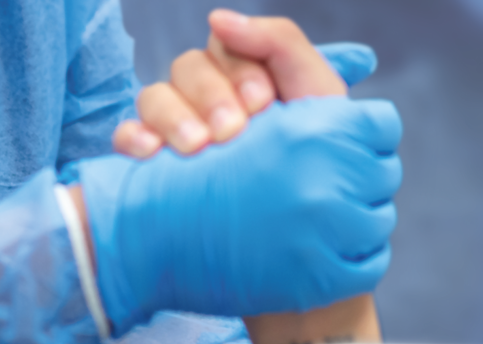 Patient and doctor hands clasping